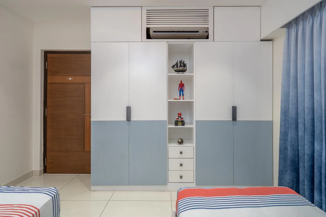 A children's room in blue and white joinery