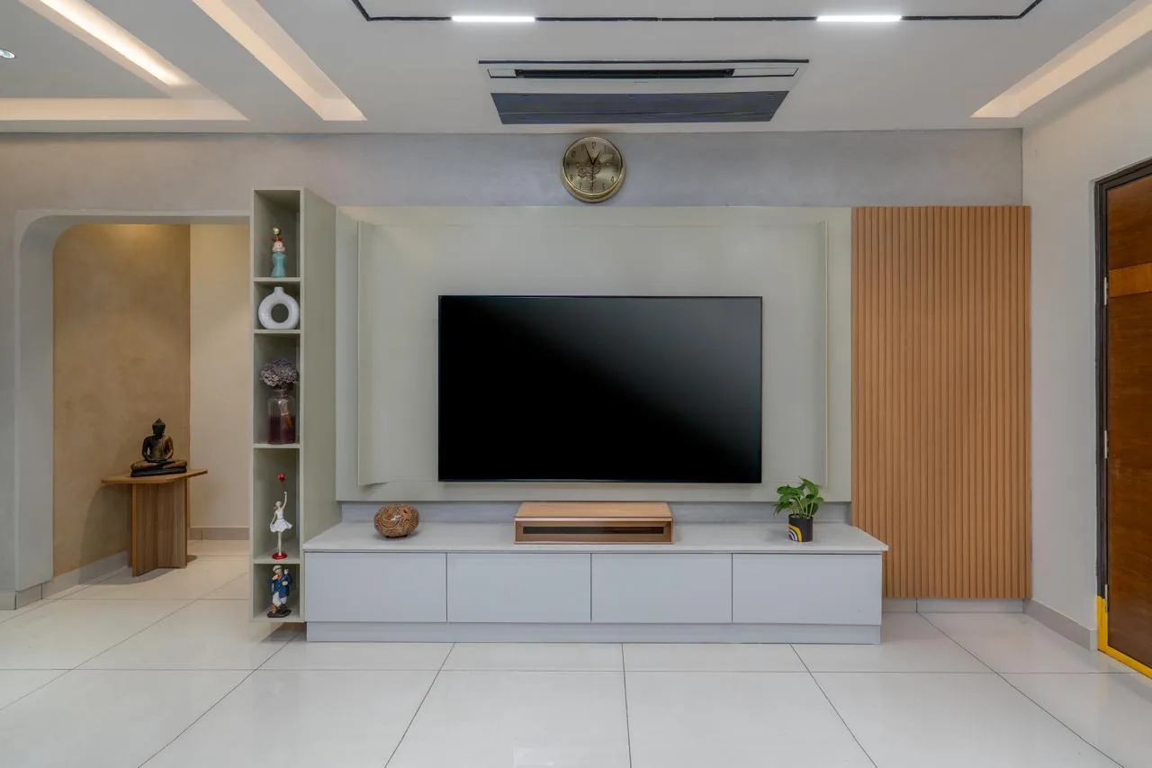 The living room media wall in oak and stone