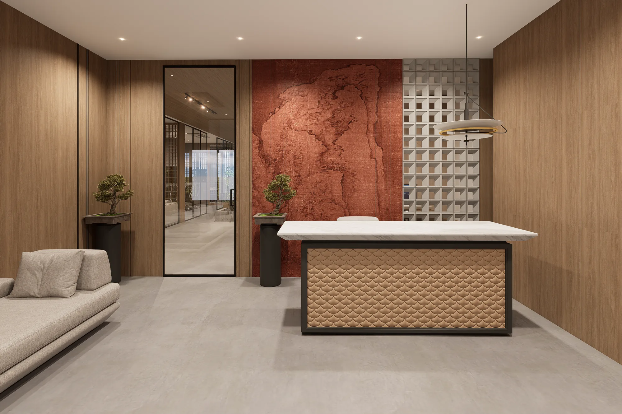 A reception desk against a terracotta wall, under warm light